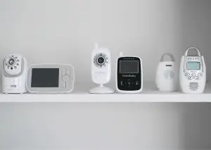 Baby Monitors On a Wooden Shelf
