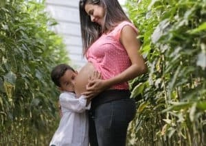 pregnant woman with a child