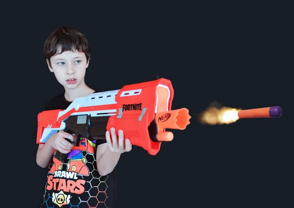 Boy playing with a Fortnite Nerf Gun