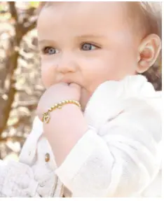 Baby wearing a bracelet