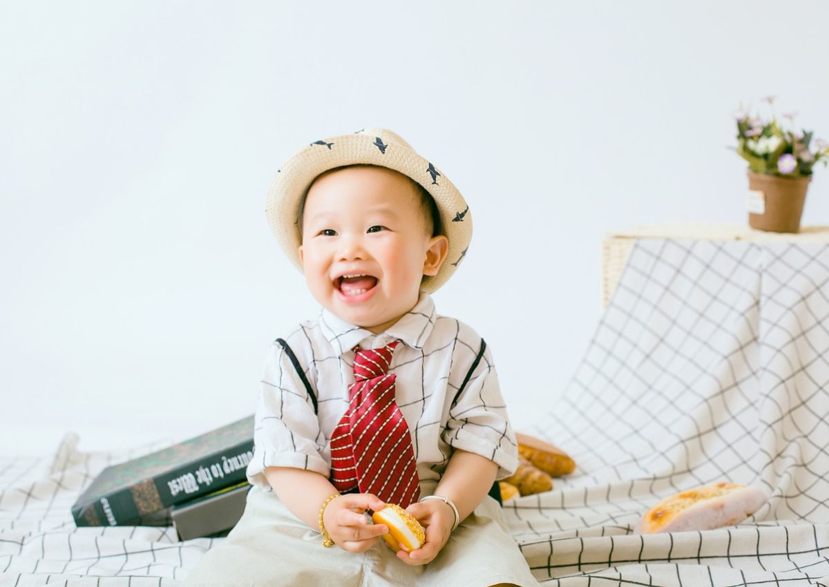 baby boy asian wearing hat and tie