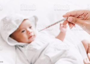 giving medicine to newborn